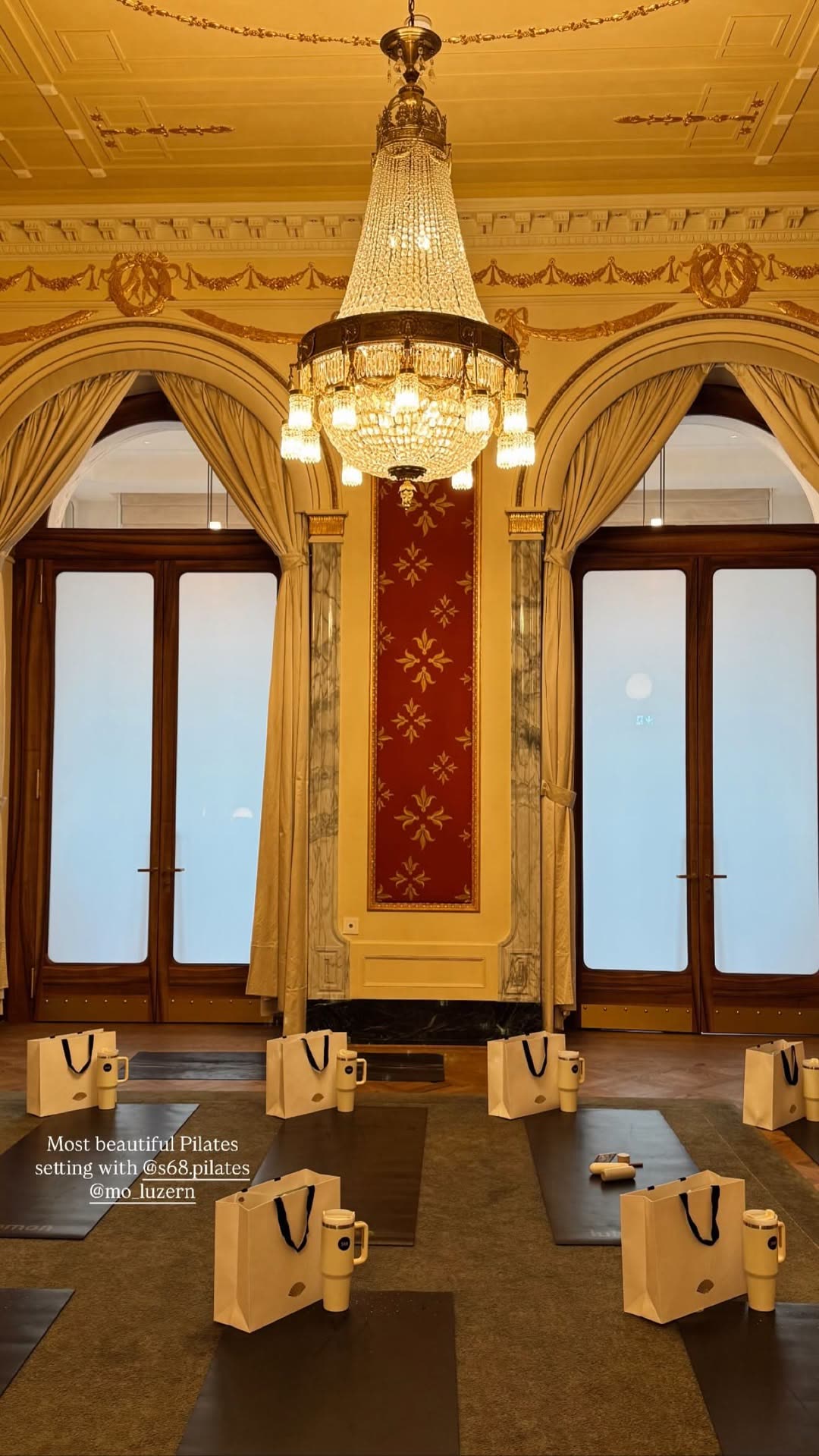 Mo Luzern rococo arch — chandelier & damask wall